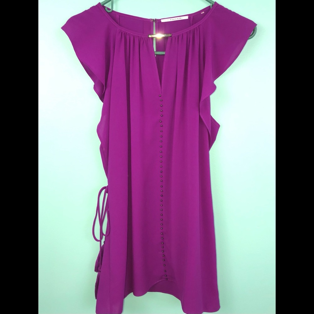 - Tahari top with flutter sleeves and tie sides.